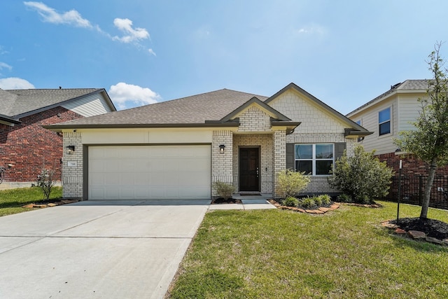 ranch-style house featuring a garage and a front lawn