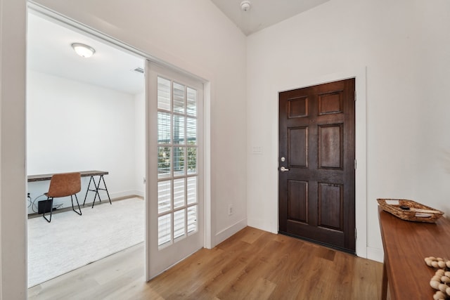 foyer entrance featuring light hardwood / wood-style floors