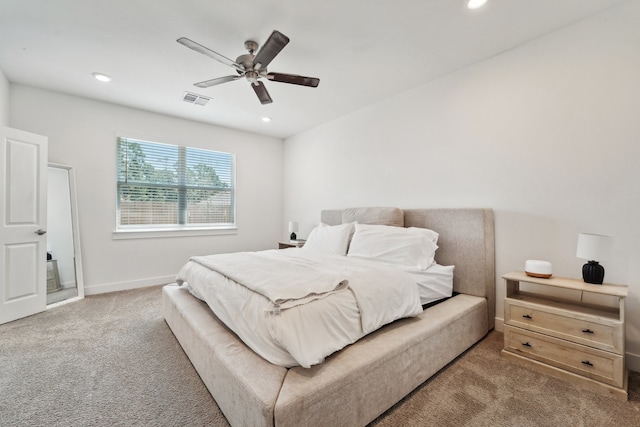 carpeted bedroom with ceiling fan