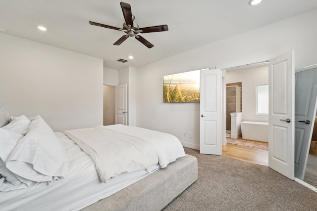 carpeted bedroom with ceiling fan