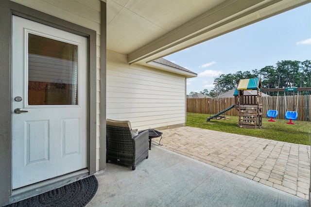 view of patio featuring a playground