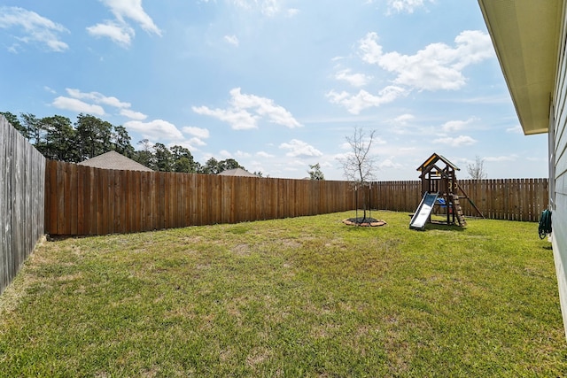 view of yard with a playground