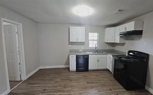 kitchen featuring black appliances, white cabinetry, and dark wood-type flooring