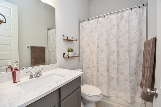 full bathroom with toilet, shower / tub combo, and vanity