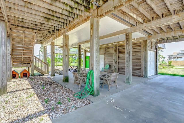 view of patio with an outbuilding