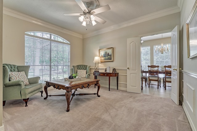 office space featuring light carpet, ceiling fan with notable chandelier, and crown molding