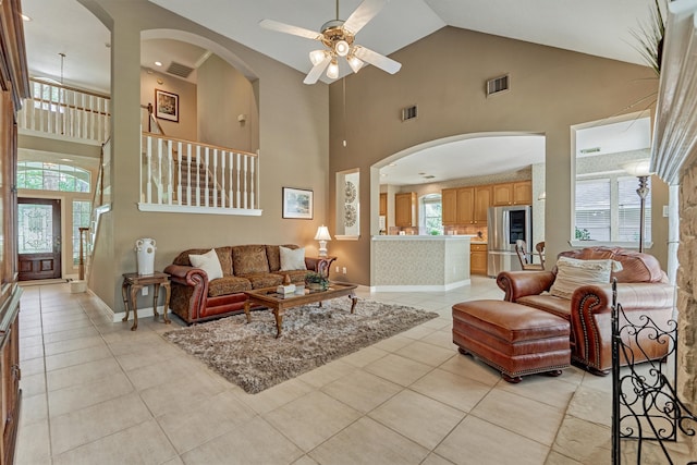 living area featuring visible vents and a wealth of natural light