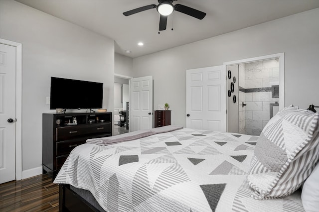 bedroom featuring ceiling fan, ensuite bath, and dark hardwood / wood-style floors