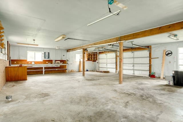 garage featuring a garage door opener