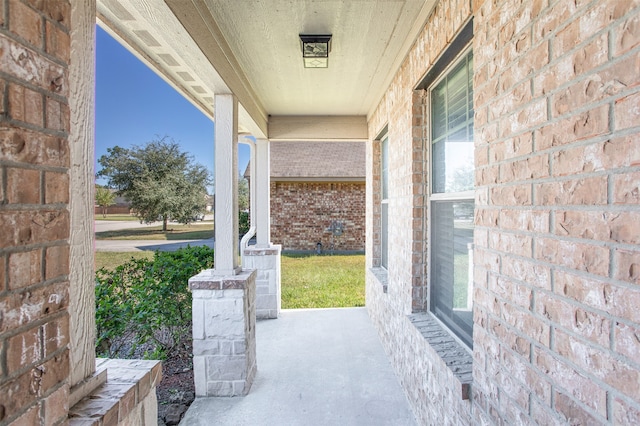 view of patio featuring a porch