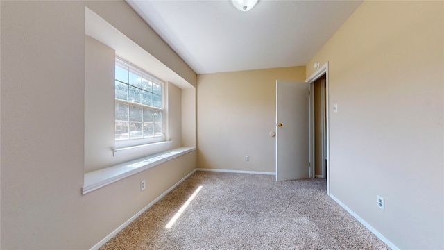 view of carpeted spare room