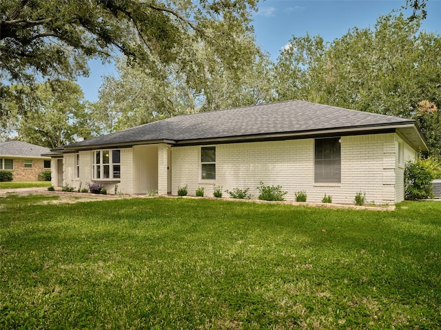 ranch-style home with a front yard