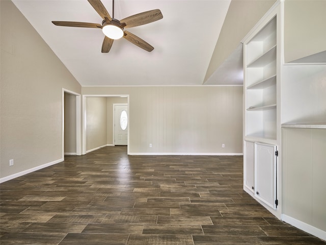 unfurnished living room with dark wood-type flooring, built in shelves, ceiling fan, and lofted ceiling