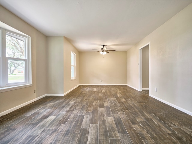 unfurnished room featuring dark hardwood / wood-style flooring and ceiling fan