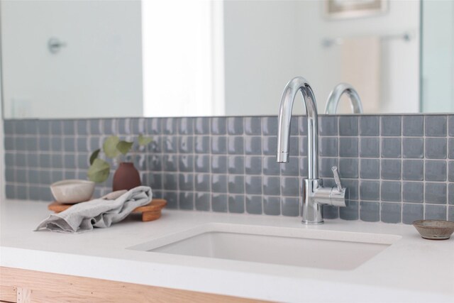 505 Graceland St, Houston, TX 77009 - details with tasteful backsplash and a sink