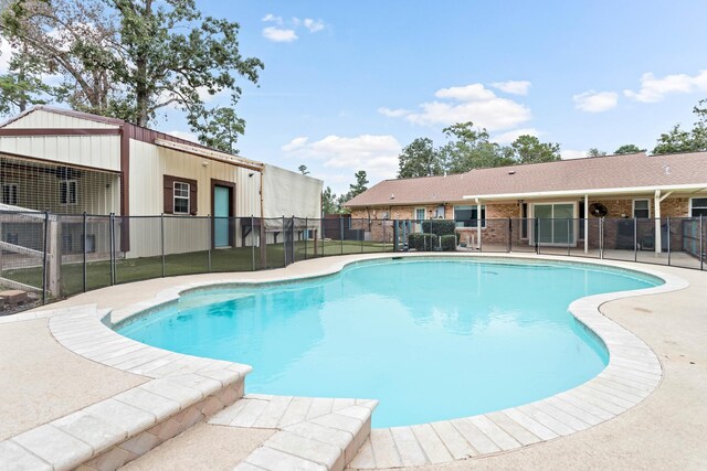 view of pool with a patio area