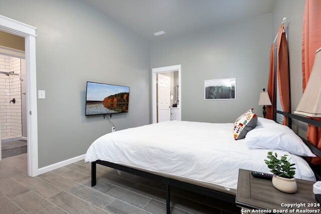 bedroom featuring ensuite bathroom