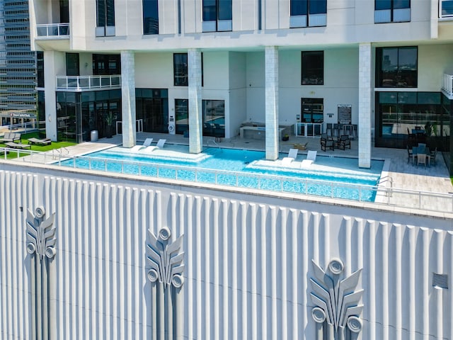 view of pool with a patio area