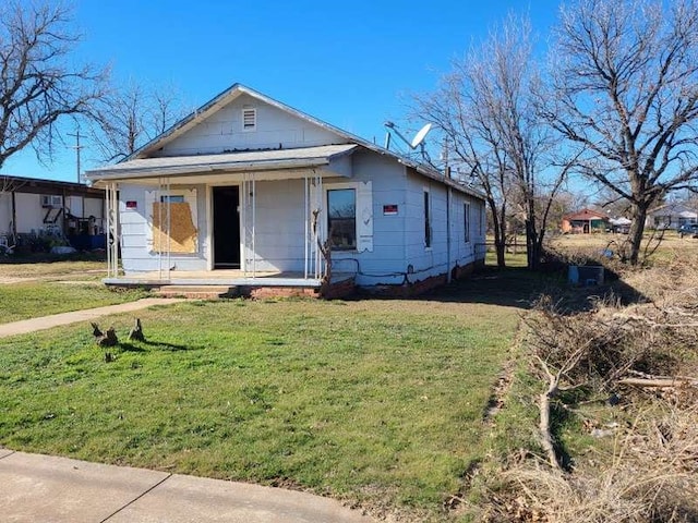 bungalow with a front lawn