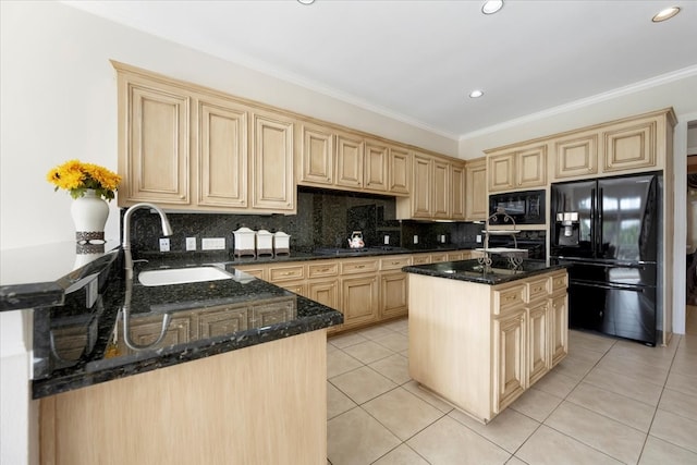 kitchen with black appliances, light tile patterned floors, a center island, crown molding, and dark stone countertops