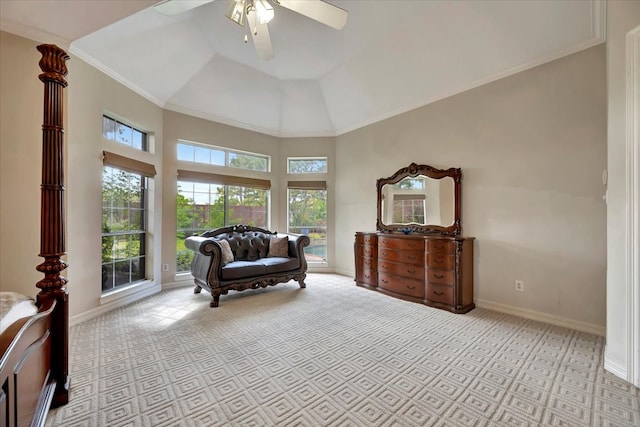 sitting room with ceiling fan, ornamental molding, and high vaulted ceiling