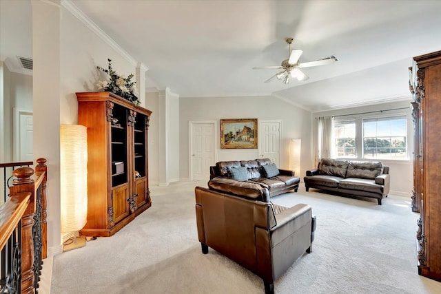 living room featuring crown molding, light colored carpet, ceiling fan, and vaulted ceiling