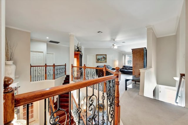 corridor featuring carpet and crown molding