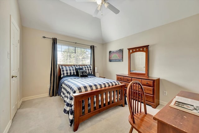 carpeted bedroom with vaulted ceiling and ceiling fan