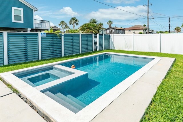 view of swimming pool featuring an in ground hot tub