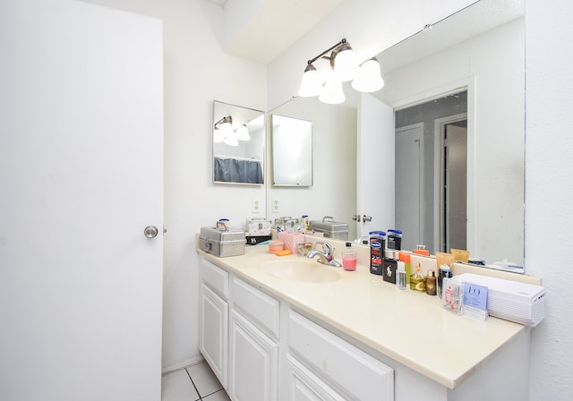 bathroom featuring vanity and tile patterned flooring