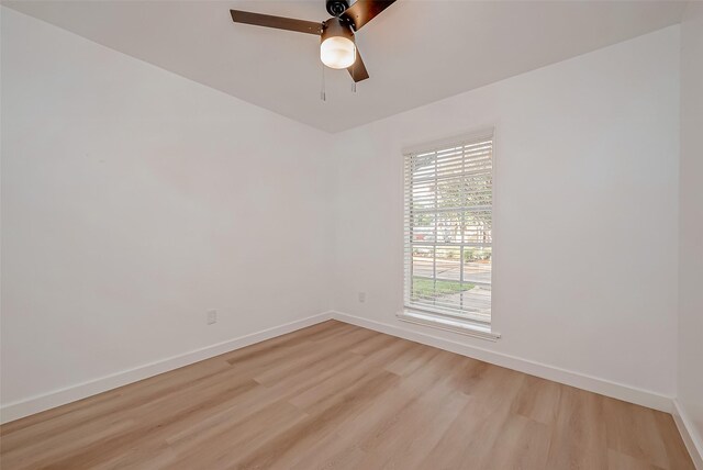 unfurnished room featuring ceiling fan and light hardwood / wood-style flooring