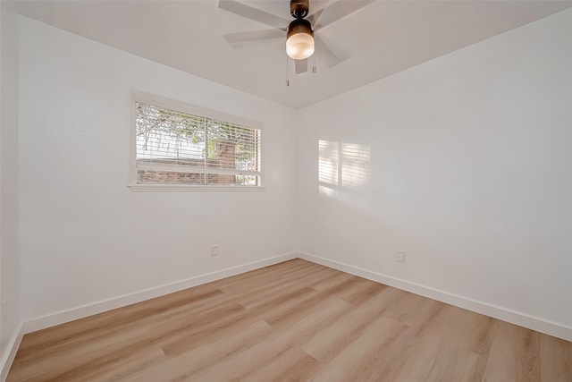 empty room featuring light hardwood / wood-style floors and ceiling fan