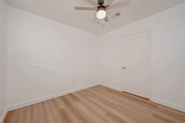 unfurnished room featuring light hardwood / wood-style floors and ceiling fan