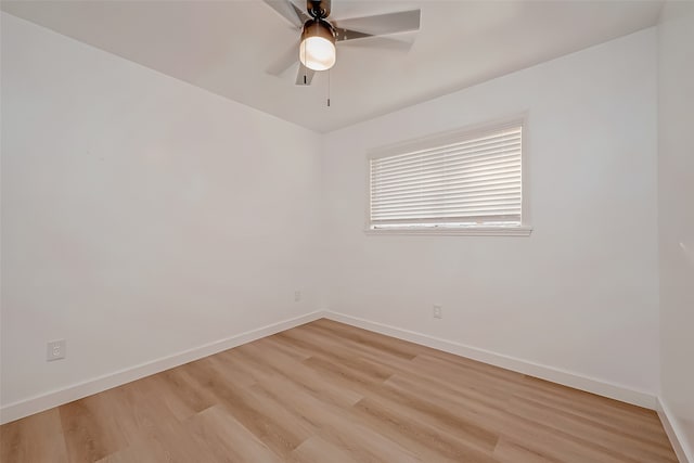 spare room with light hardwood / wood-style floors and ceiling fan