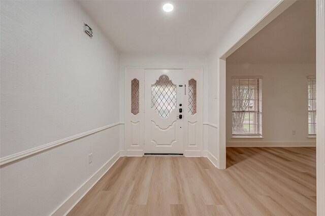 entrance foyer with light wood-type flooring