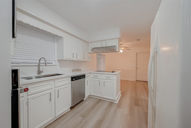 kitchen with white refrigerator, sink, white cabinetry, kitchen peninsula, and stainless steel dishwasher