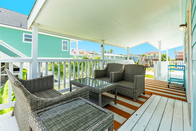 wooden deck with outdoor lounge area