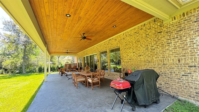 view of patio / terrace with grilling area and ceiling fan