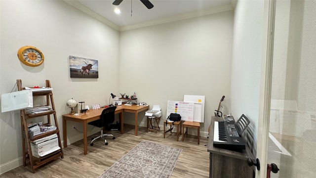 home office with crown molding, hardwood / wood-style floors, and ceiling fan