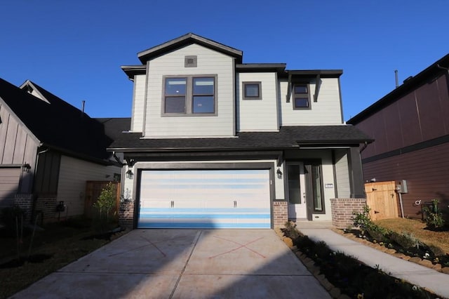 view of front of property with a garage