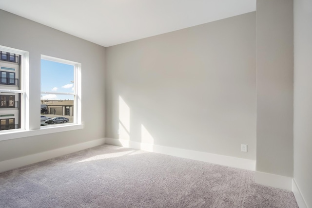 spare room featuring carpet