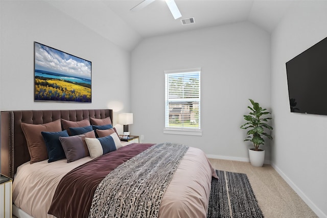 carpeted bedroom with lofted ceiling and ceiling fan