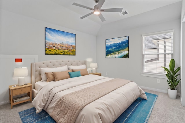 bedroom with carpet floors, lofted ceiling, and ceiling fan