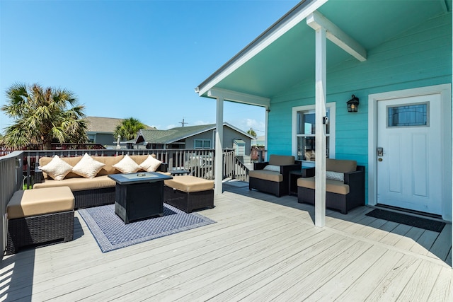 wooden deck with outdoor lounge area