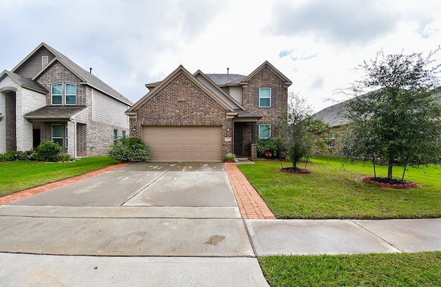 craftsman house with a front yard and a garage