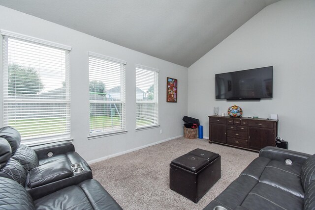 living room featuring vaulted ceiling and light colored carpet