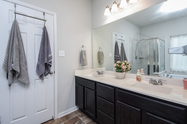 bathroom with independent shower and bath and vanity