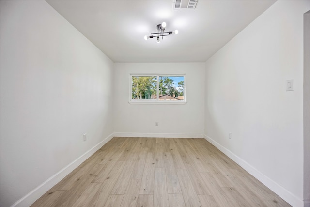 empty room featuring light hardwood / wood-style floors