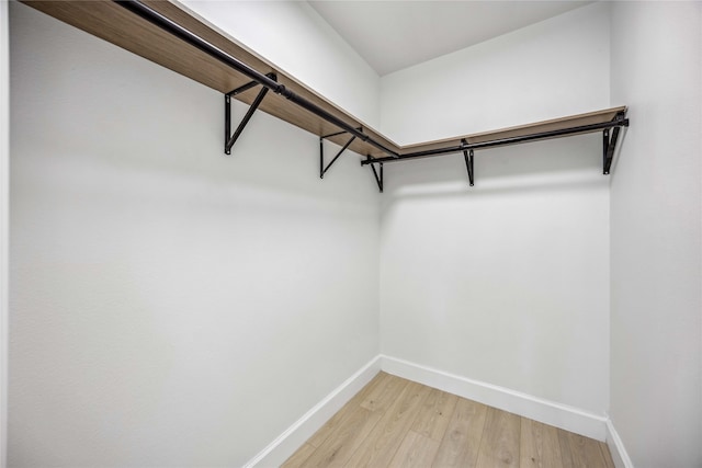 walk in closet featuring light wood-type flooring