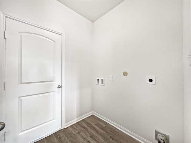 washroom featuring hookup for a washing machine, dark wood-type flooring, and electric dryer hookup